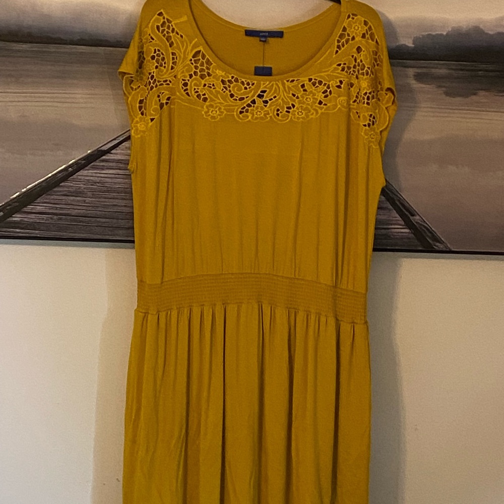 Beautiful yellow/mustard dress. Embroidered with cinch waist
